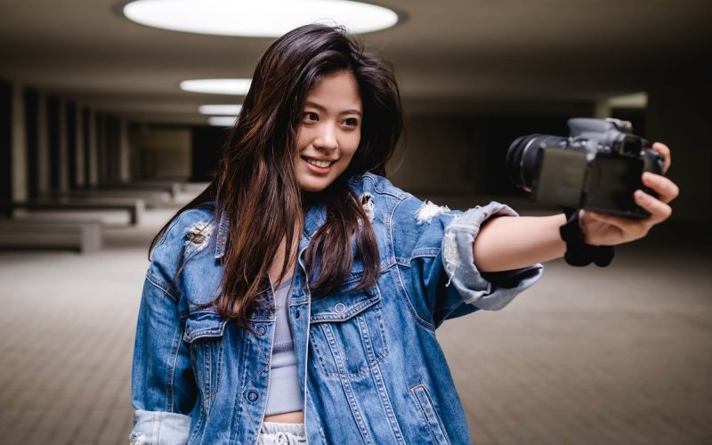 asian-woman-vlogging-and-using-camera-social-media-influencer-content-creator-lifestyle