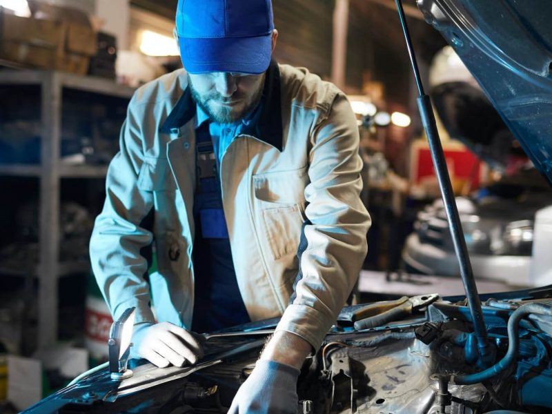 repairman-fixing-engine-detail