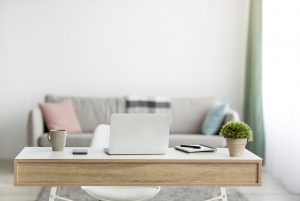 Home office, comfortable workplace with computer and furniture