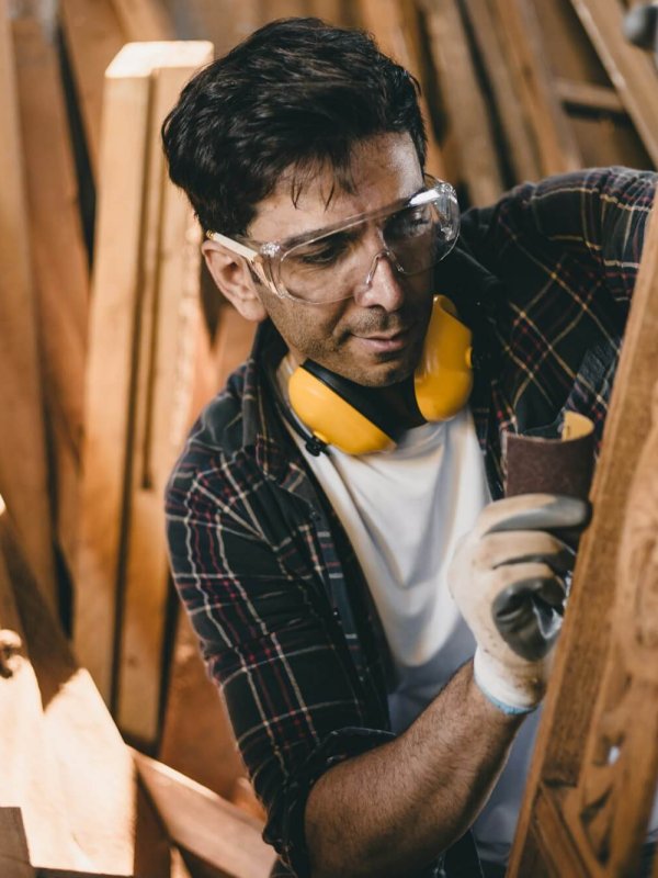 portrait professional carpenter man hand working make wooden handcraft furniture master workpiece