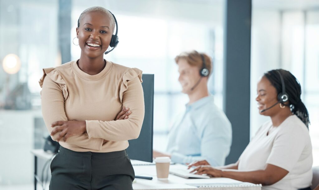 Happy black woman, call center and contact us for customer service and telemarketing insurance agen
