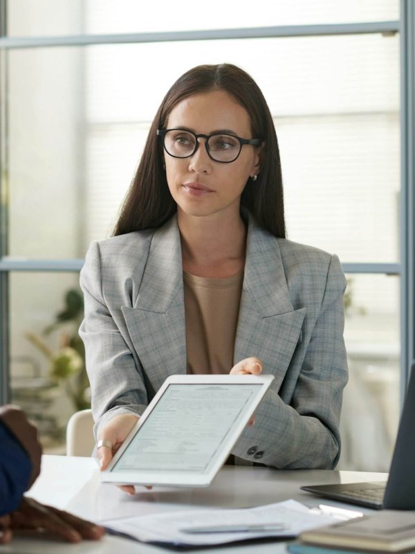 Insurance agent signing contract with client