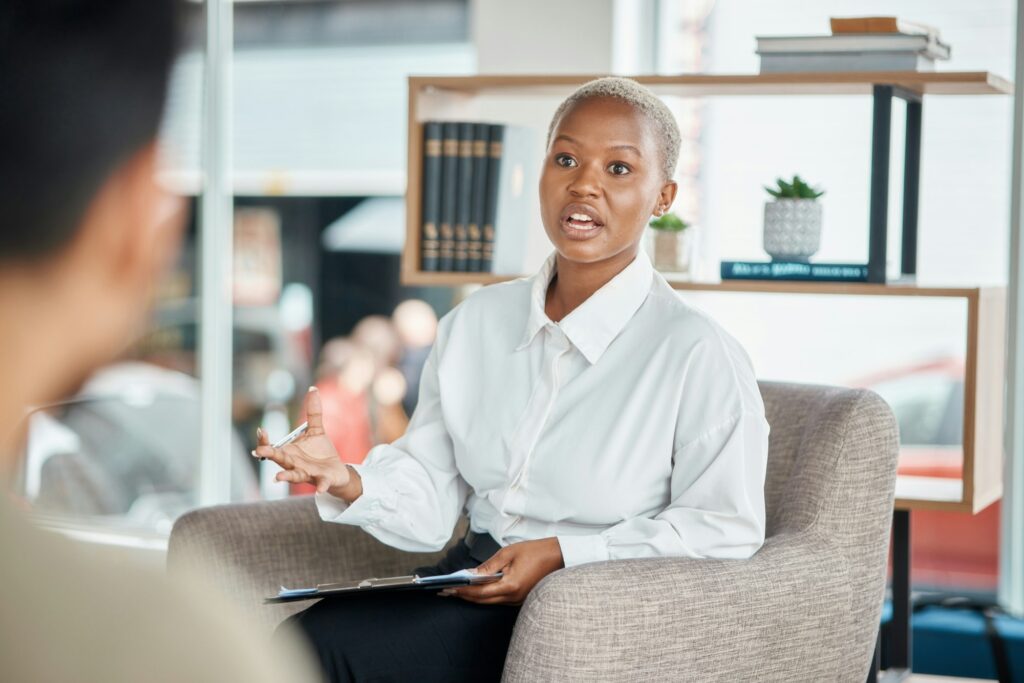 Consulting, psychology and mental health with black woman in office for support, advice and counsel