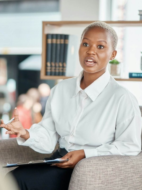 Consulting, psychology and mental health with black woman in office for support, advice and counsel