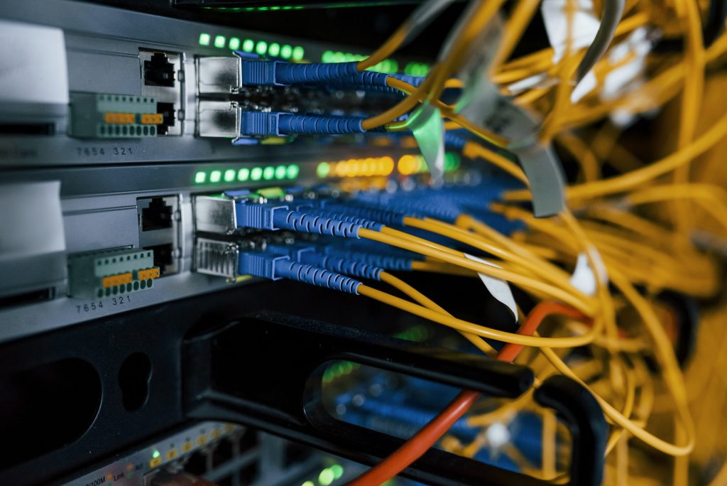 Close up view of internet equipment and cables in the server room